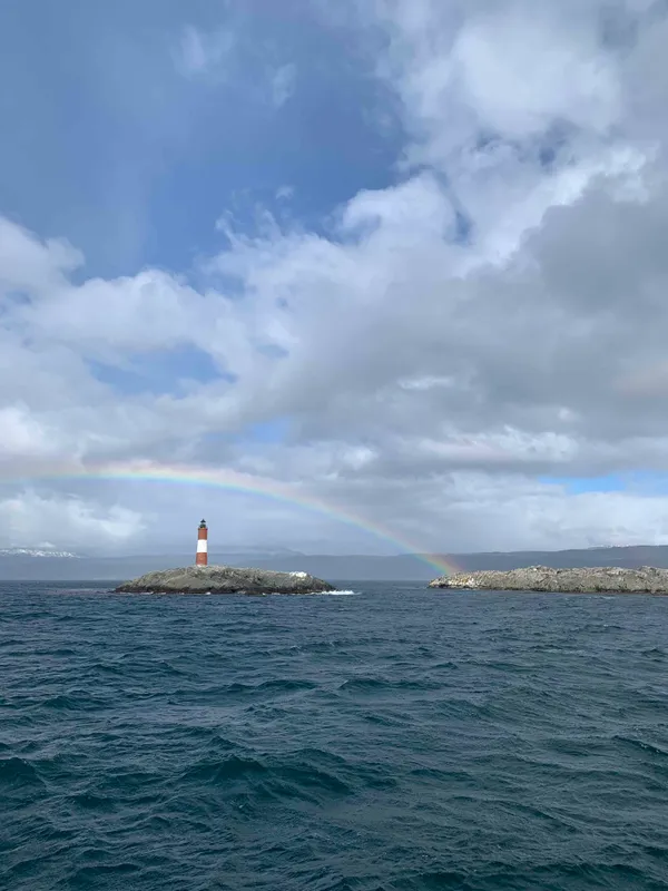 Lighthouse Les Éclaireurs with rainbow over Beagle Channel