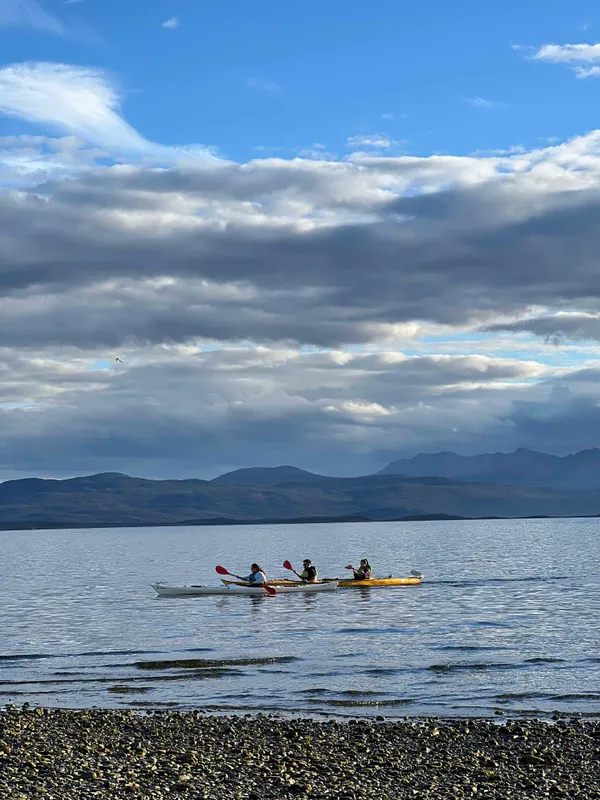 Kayak group on beach break during Beagle Channel tour