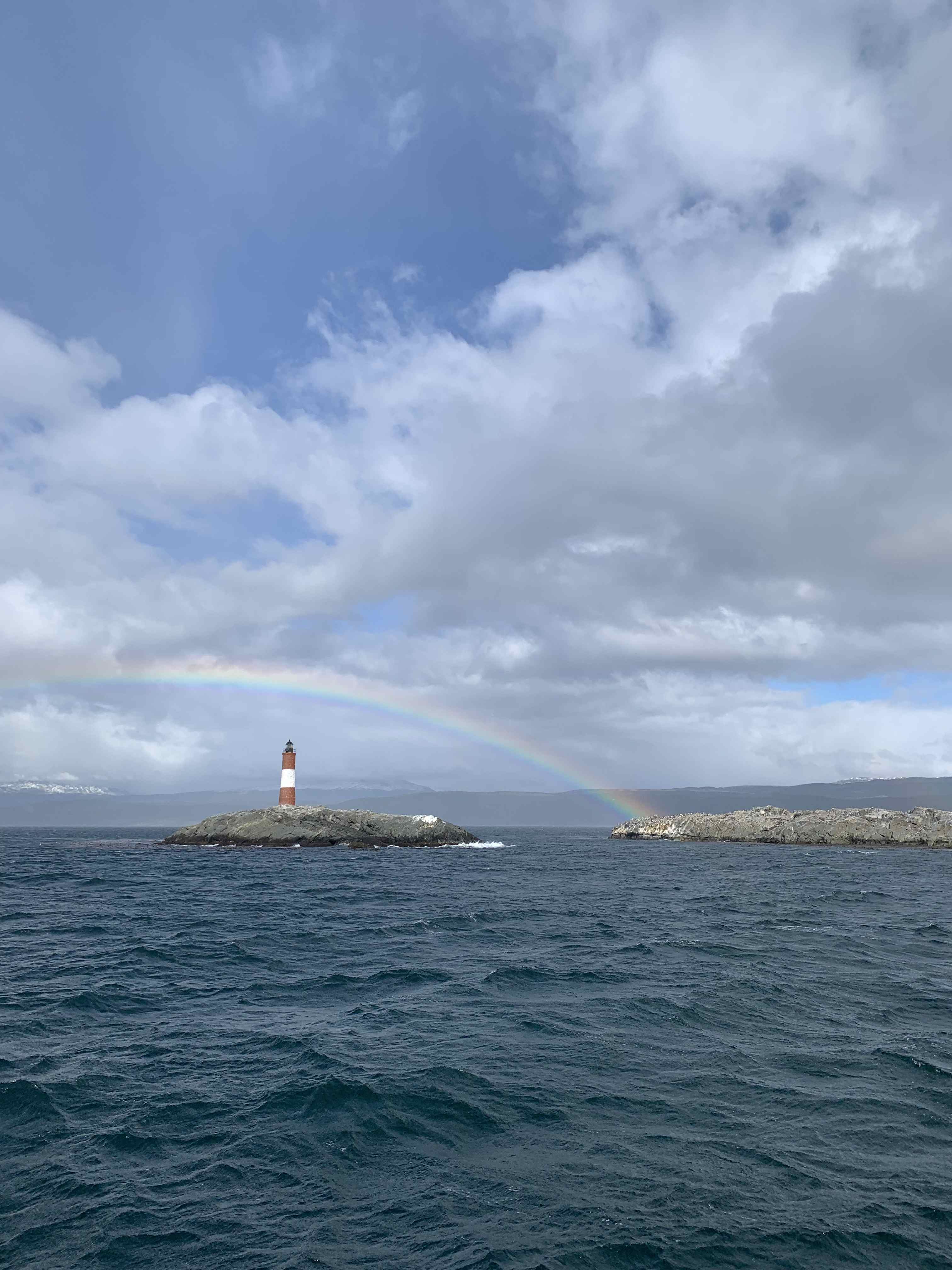 Lighthouse Les Éclaireurs with rainbow over Beagle Channel
