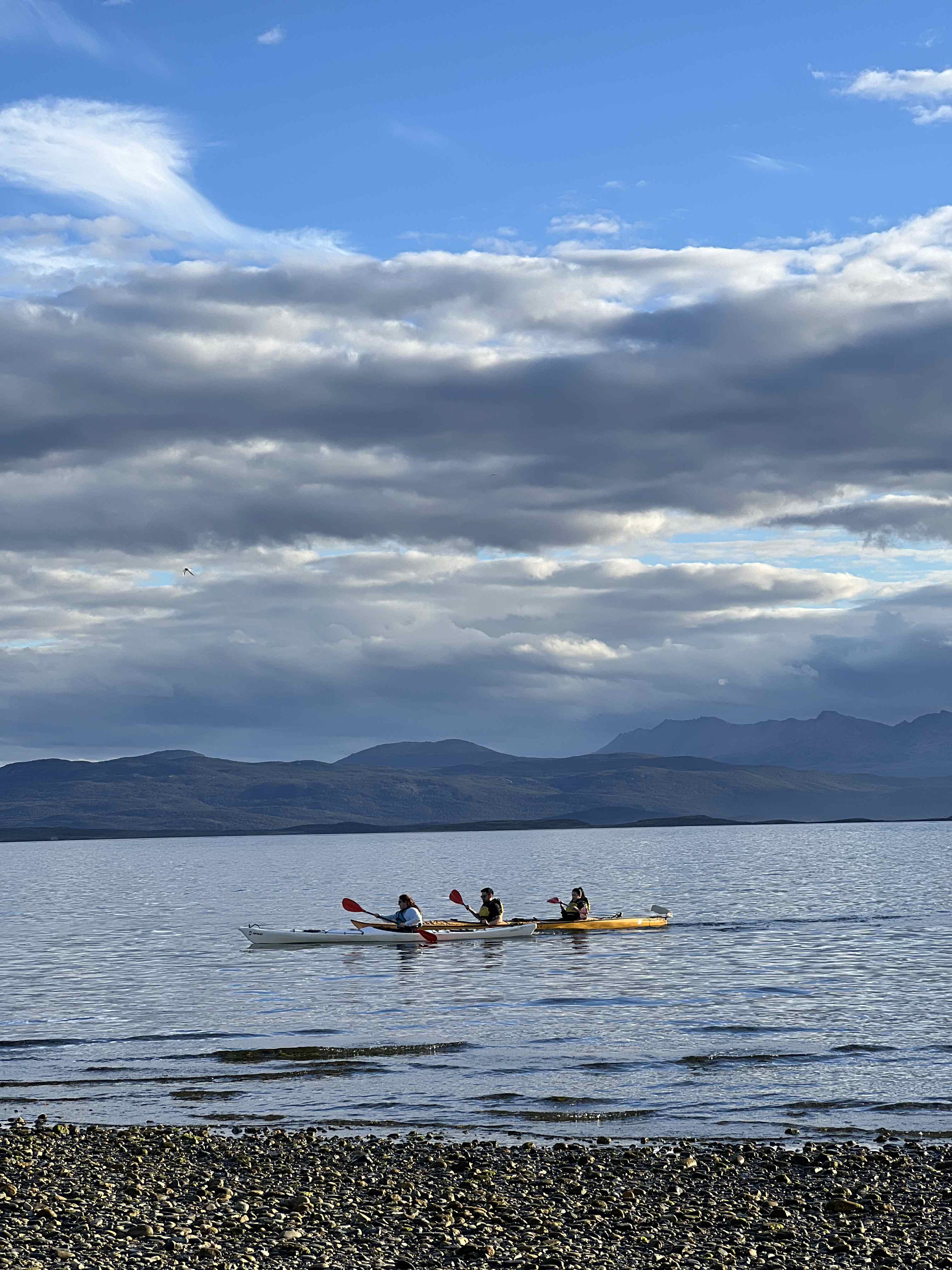 Kayak group on beach break during Beagle Channel tour